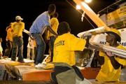 100 добровольных священников Церкви Саентологии из 22 стран доставляют 100 тонн гуманитарной помощи на Гаити